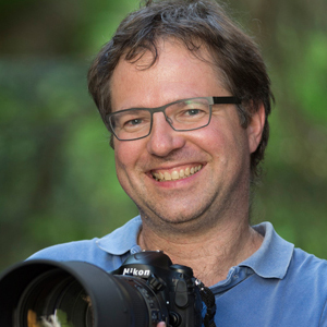 olaf krüger fotograf mit kamera portrait